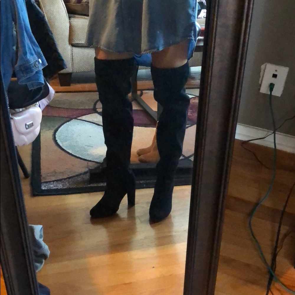 Over the knee black boots